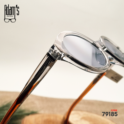 Transparent brown oval Amber 98119 sunglasses with clear grey tinted lenses
